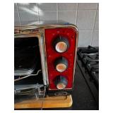 Oster Countertop Toaster Oven - Red Front Panel, 3 Dial Controls
