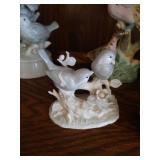 Top Shelf of Bird Figurines