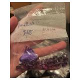 Collection of Amethyst Gemstone Beads in Assorted Shapes and Sizes