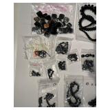 Collection of Black Gemstone and Glass Beads in Various Sizes and Shapes