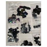 Large Collection of Black Gemstone Beads and Cabochons in Assorted Styles