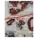 Collection of Red Glass, Stone, and Ceramic Beads Assorted Shapes and Sizes