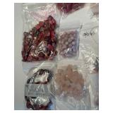 Collection of Assorted Pink and Red Gemstone Beads in Mixed Shapes and Sizes