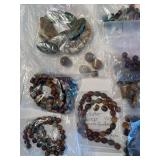 Assorted Collection of Semi-Precious Stone Beads and Bracelets in Various Shapes