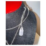 Sterling Silver Necklace with Garnet Accents and Circular Pendant