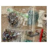 Large Collection of Assorted Beads and Strands in Plastic Storage Bin