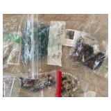 Large Collection of Assorted Beads and Strands in Plastic Storage Bin