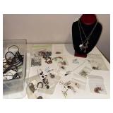 Collection of Artisan Jewelry Including Necklaces, Earrings, and Bracelets