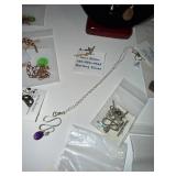 Collection of Artisan Jewelry Including Necklaces, Earrings, and Bracelets