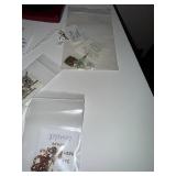 Collection of Artisan Jewelry Including Necklaces, Earrings, and Bracelets