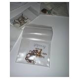 Collection of Artisan Jewelry Including Necklaces, Earrings, and Bracelets