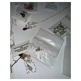Collection of Artisan Jewelry Including Necklaces, Earrings, and Bracelets