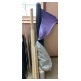 Assorted Fabric and Material Rolls Including Vinyl, Velvetex, and Wrapping Paper