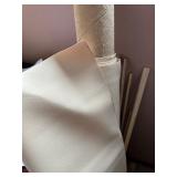 Assorted Fabric and Material Rolls Including Vinyl, Velvetex, and Wrapping Paper