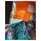 Collection of Assorted Fabric Remnants and Fat Quarters with Patterns