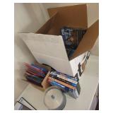 Collection of DVDs and Blu-rays including Finding Dory, Happy Feet, and Mystery Series