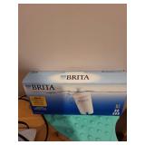 Lot of Household Appliances Including Conair Steamer, GermGuardian UV Sanitizer, Iron, and Brita Filters