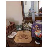 Assorted Collectibles Including EPCOT Food & Wine Board, Department 56 Bunny, and Disney Mail Holder