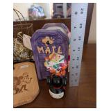 Assorted Collectibles Including EPCOT Food & Wine Board, Department 56 Bunny, and Disney Mail Holder