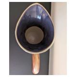 Vintage Embossed Floral Ceramic Pitcher with Scroll Handle