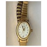 Timex Gold-Tone Wristwatch with Assorted Gold Jewelry