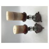 2 pillar candle holders with candles