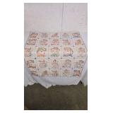 Vintage Baby Quilt with cross stitching animals.