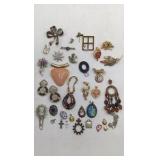 Assortment of Brooches and Necklace Pendants