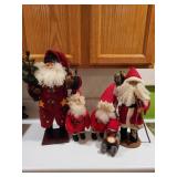 Collection of 4 Vintage Santa Claus Figurines with Red Outfits