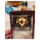 Assorted Decorative Collectibles and Jewelry Including Porcelain Miniatures and 1928 Brooch