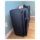 TravelPro 2-Piece Black Luggage Set - Carry-On & Upright Rolling Suitcases