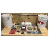 Buckets filled with various items