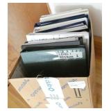 Rm 207 - Counter full of binders, bookshelf etc