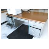 by Rm 204 -  steel desk and floor mat