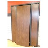 Rm 202 - murphy bed style cafeteria tables 7 ft x 30 in tables folds out to 14 ft - walnut