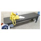 By kitchen - Bench, bookcase, lost and found clothes