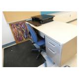 Rm 215 - steel desk and chair, monitor riser, floor mat, crayon picture