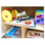 ECFE - Bookshelf and contents on 2 scooters