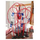 GymS- frisbee golf stands and tub of rings