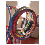 GymS- Stand full of hula hoops