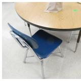 Rm 114 - Woodgrain 4ft table with 4 blue chairs