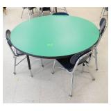 Rm 114 - Green 4ft table with 4 blue chairs