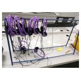 Rm 114B - stand full of headphones