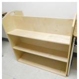 Rm 111B - 2 light stands and a double sided bookshelf and 3 balance discs