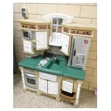 by Rm 110 - play kitchen