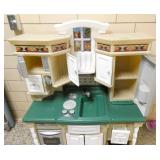 by Rm 110 - play kitchen