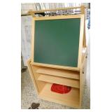 by Rm 110 - easel, play stand