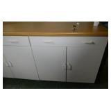 Rm 101A - cabinet 9 ft long x 25 deep x 36 tall