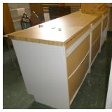 Rm 101A - cabinet 9 ft long x 25 deep x 36 tall