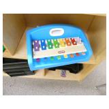 Rm 101A - shelves and contents and a chair